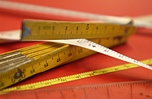 Meterstab und Messband