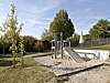 Spielplatz des Kindergartens Brandhecke Dettingen Spielplatz mit Sandkasten und Rutsche